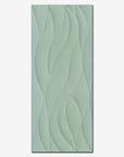 Piastrella decorata in bicottura "Decoro Wave" della MGM, da 25x60cm della serie Calipso colore Mint
