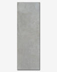 Piastrella effetto cemento in pasta bianca della Cotto Petrus, da 25x75cm della serie Harvard di colore Grey Lucido