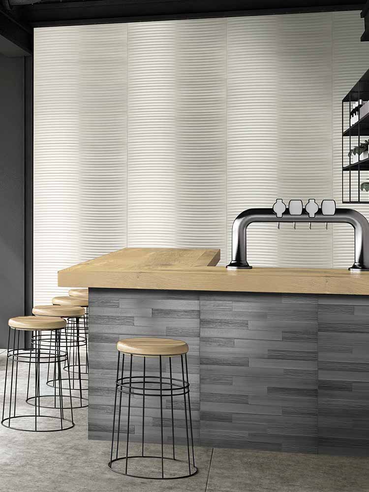 Ambiente con piastrelle in pasta bianca della MGM, da 25x75cm della serie Loft stile Brick Wall