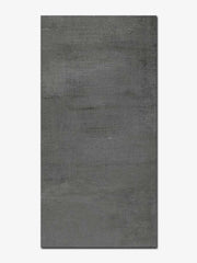 Piastrella effetto cemento in gres porcellanato della MGM, da 30x60cm della serie Industrial, colore Black