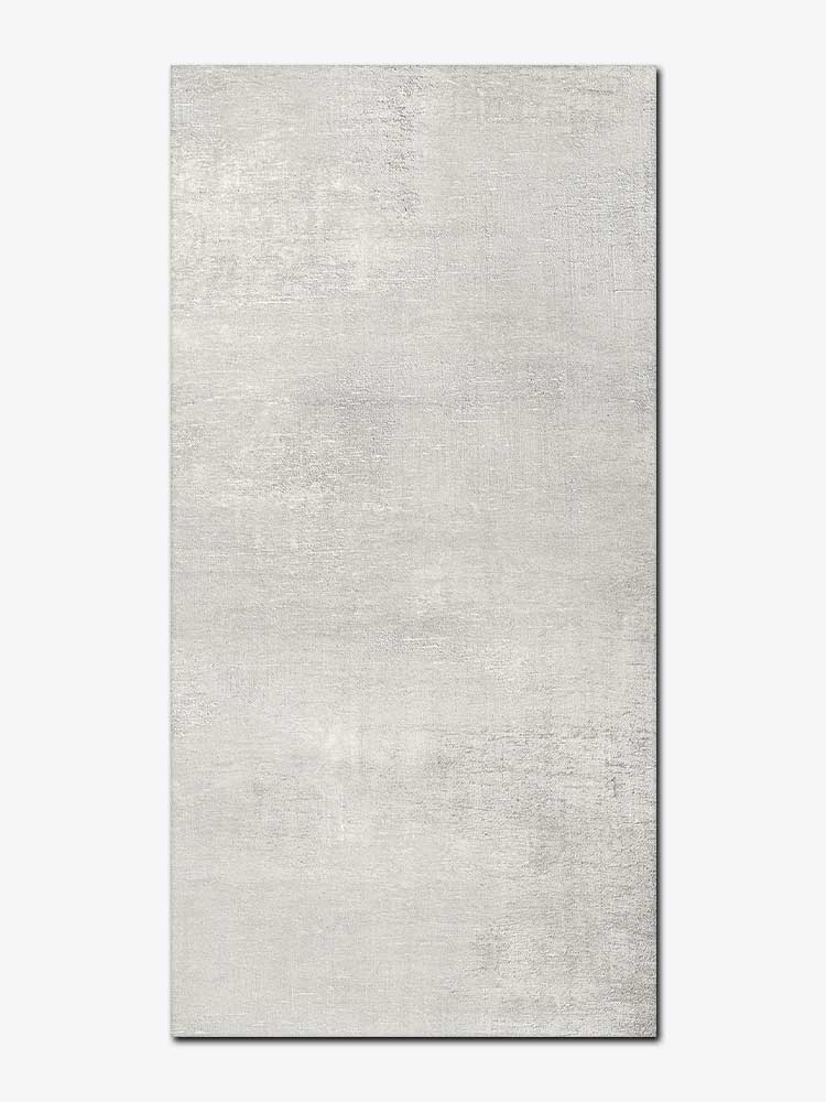 Piastrella effetto cemento in gres porcellanato della MGM, da 30x60cm della serie Industrial, colore White