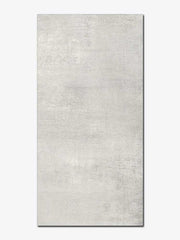 Piastrella effetto cemento in gres porcellanato della MGM, da 30x60cm della serie Industrial, colore White