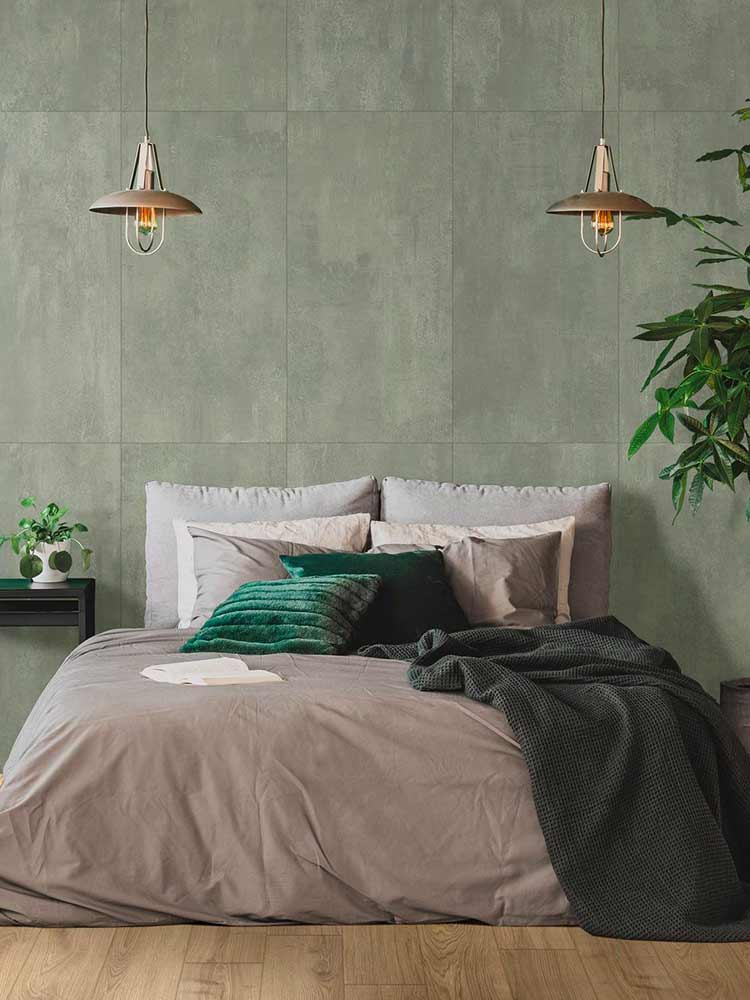 Camera da letto con rivestimenti in gres porcellanato effetto cemento della Cotto Petrus